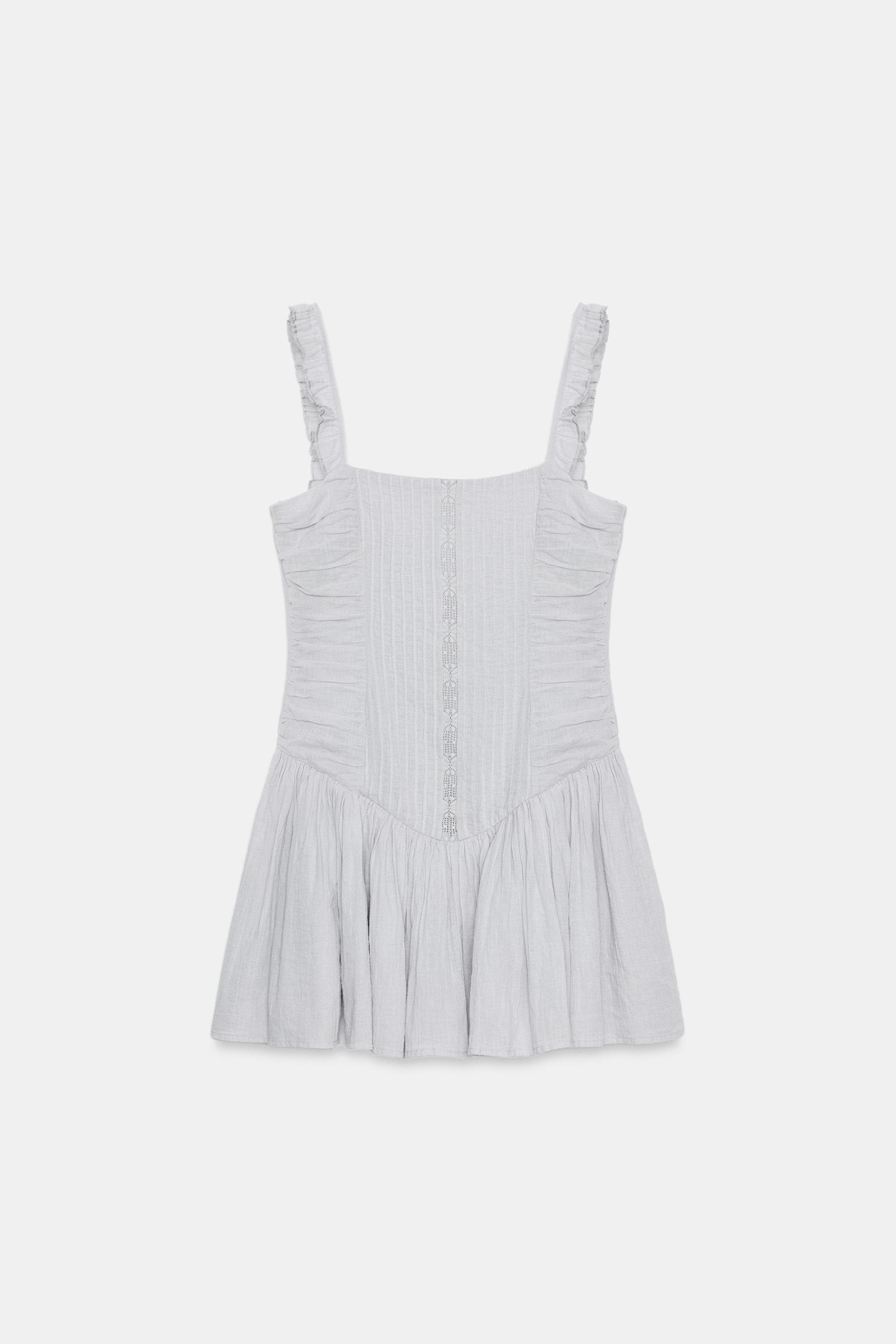ROBE COURTE BRODERIES VOLUME
